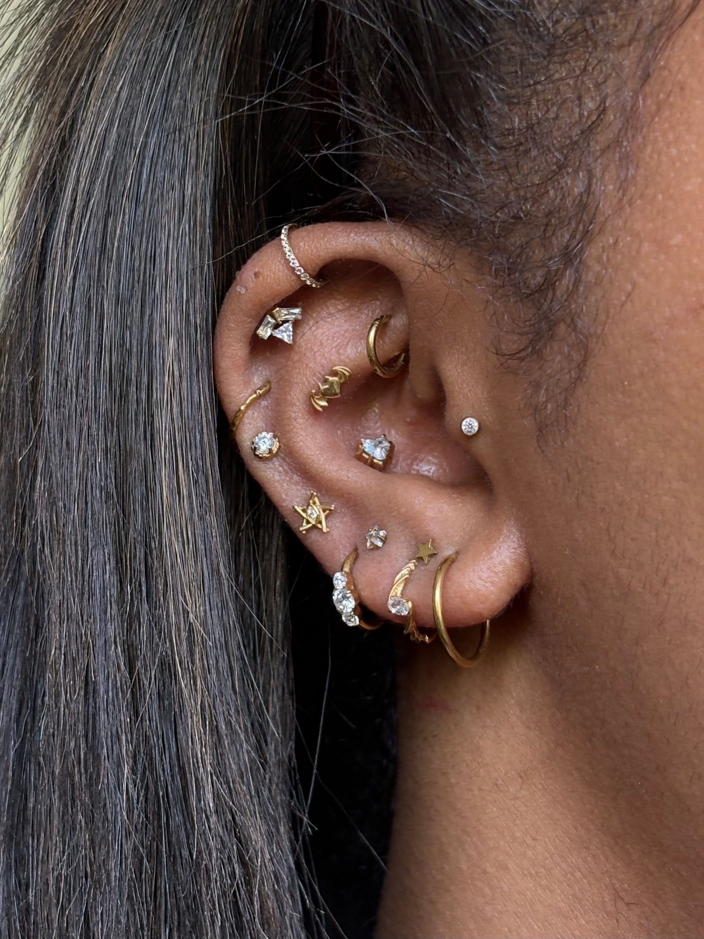 Anja ear stack featuring gold and crystal jewelry