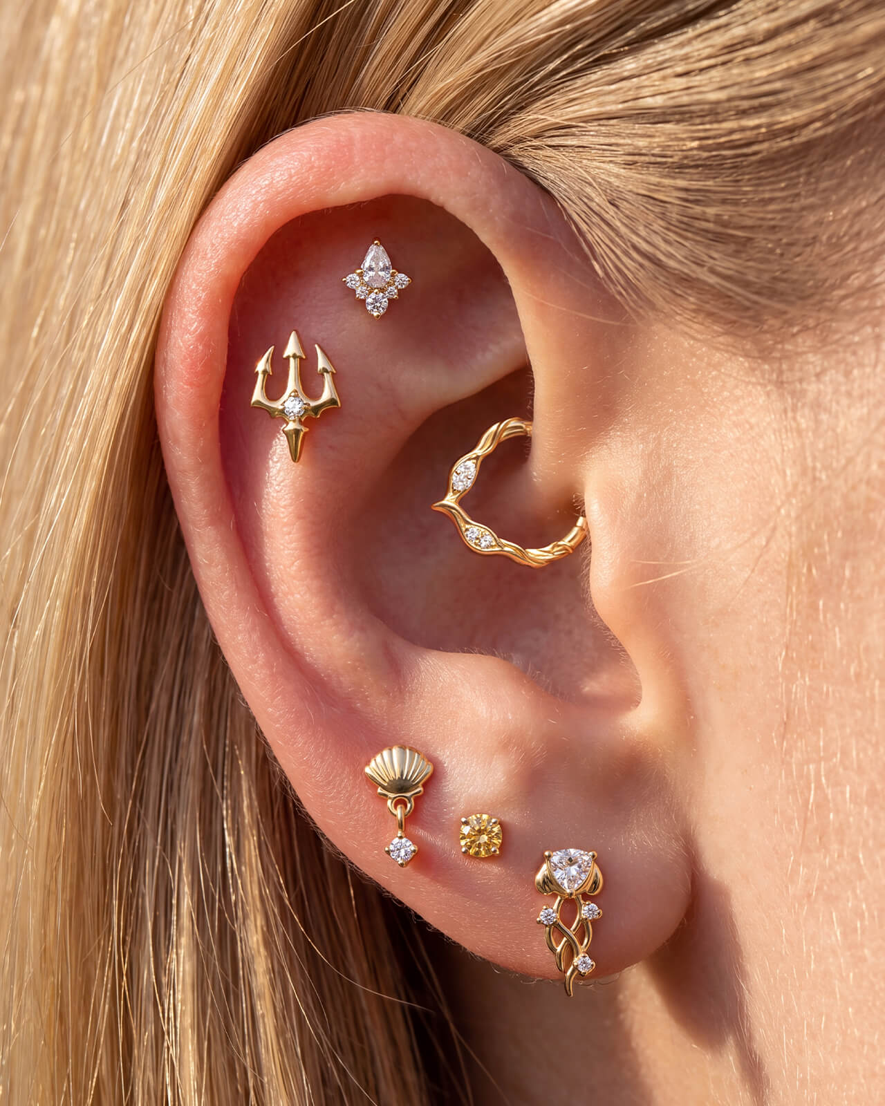 ingrid ear stack featuring gold and crystal jewelry