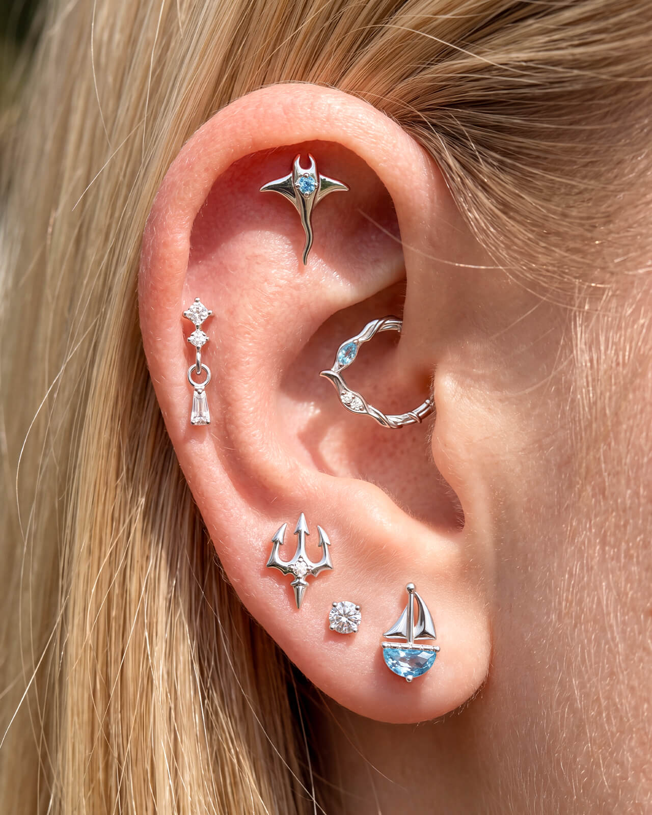 ingrid ear stack featuring gold and crystal jewelry