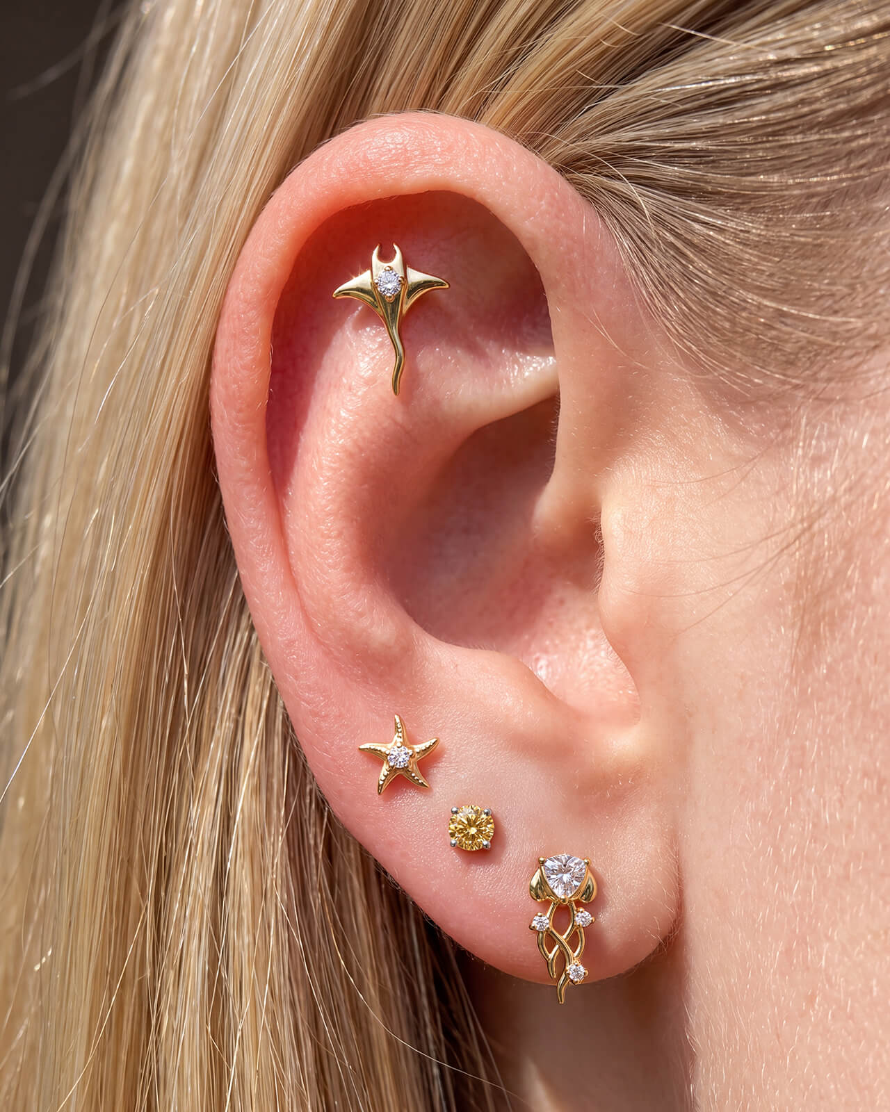 ingrid ear stack featuring gold and crystal jewelry