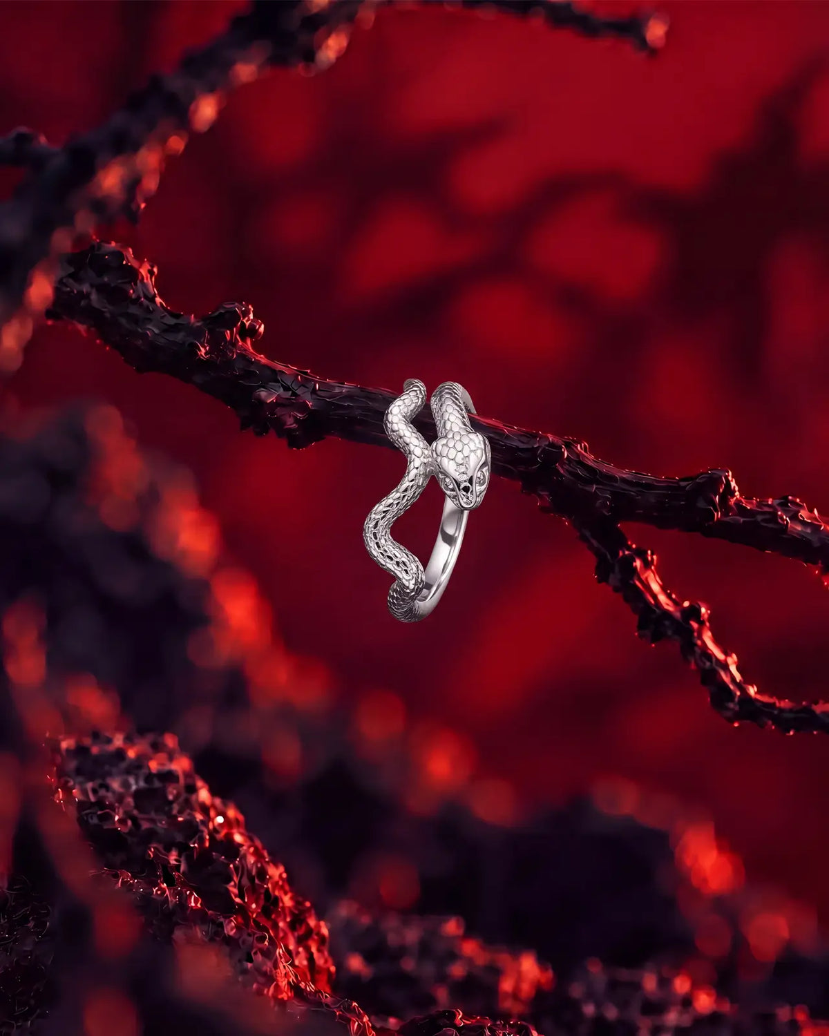 Anello clicker con serpente arrotolato