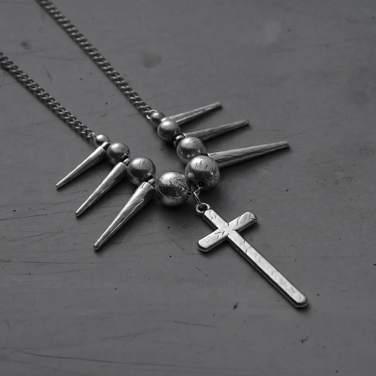 REBEL SPIKED CROSS NECKLACES