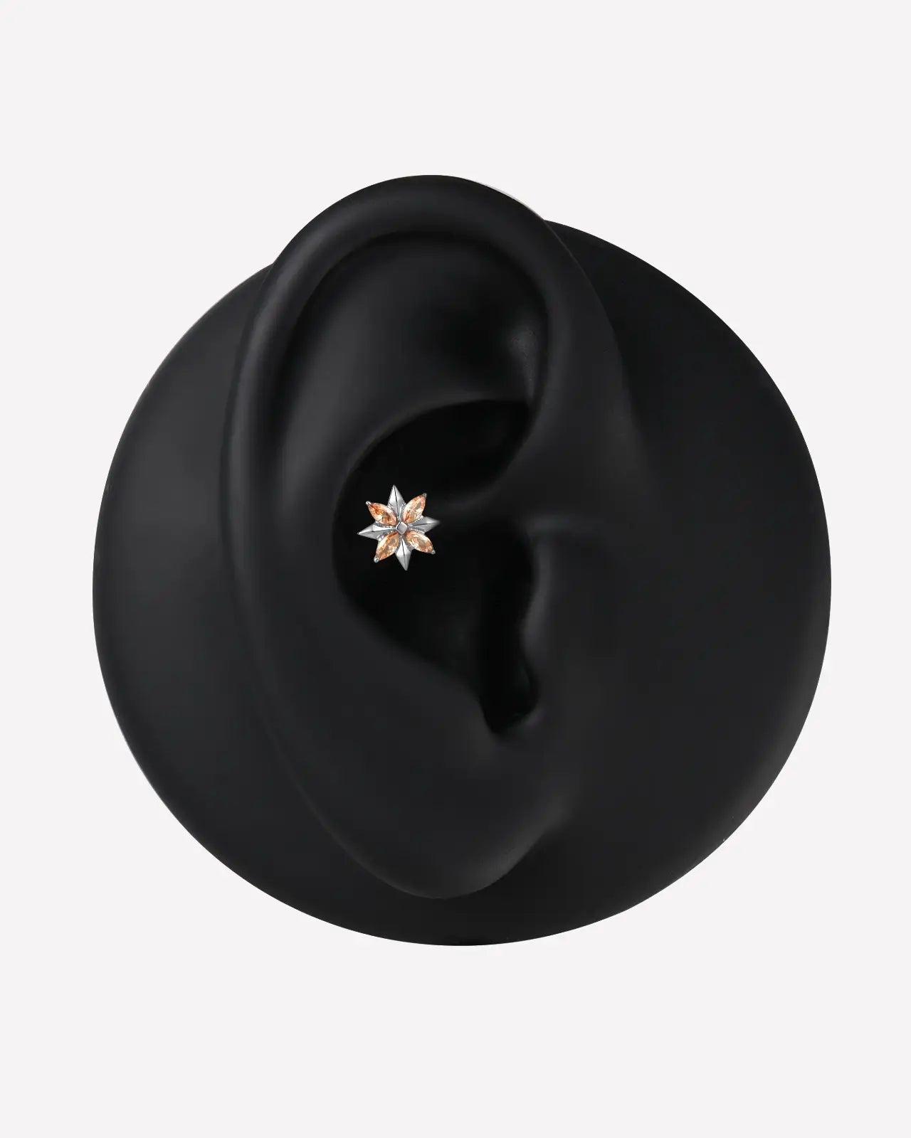 Pendiente plano con forma de estrella marquesa con púas