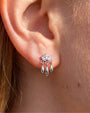 Petal Rain silver clear stone flatback stud styled on the earlobe
