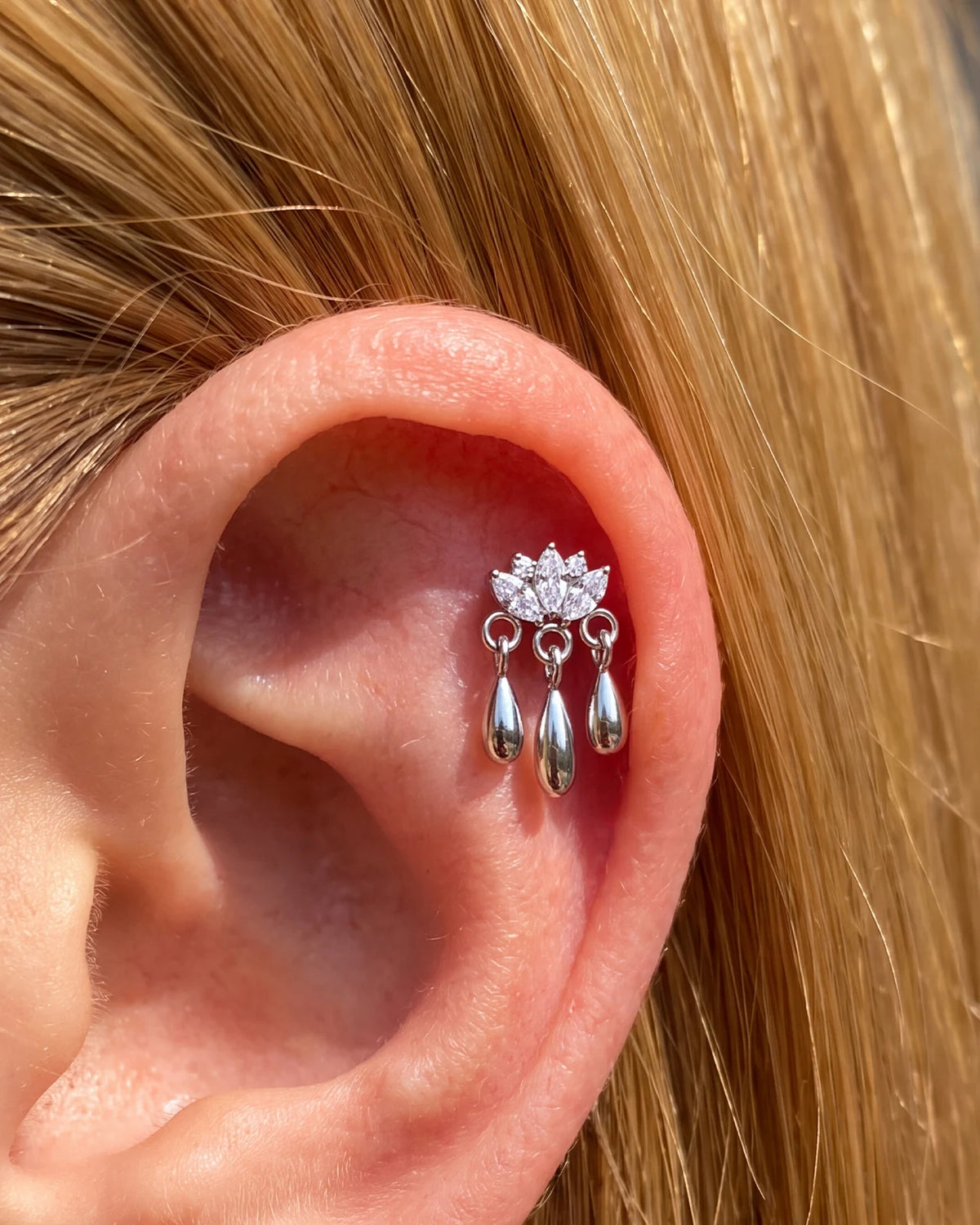 Petal Rain silver clear stone flatback stud styled on the helix
