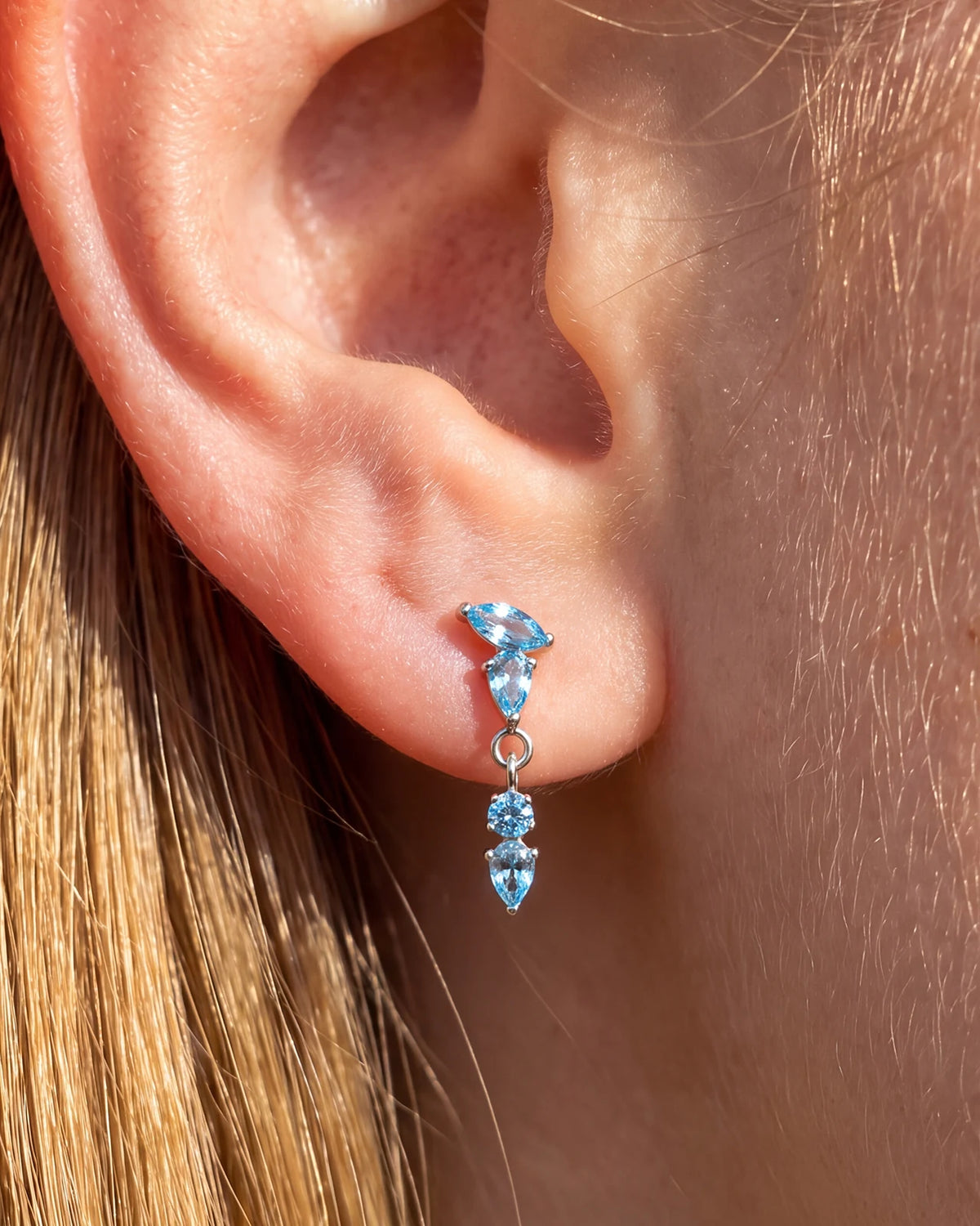 Dewfall Flatback Stud, silver with blue cubic zirconia, on-ear styling