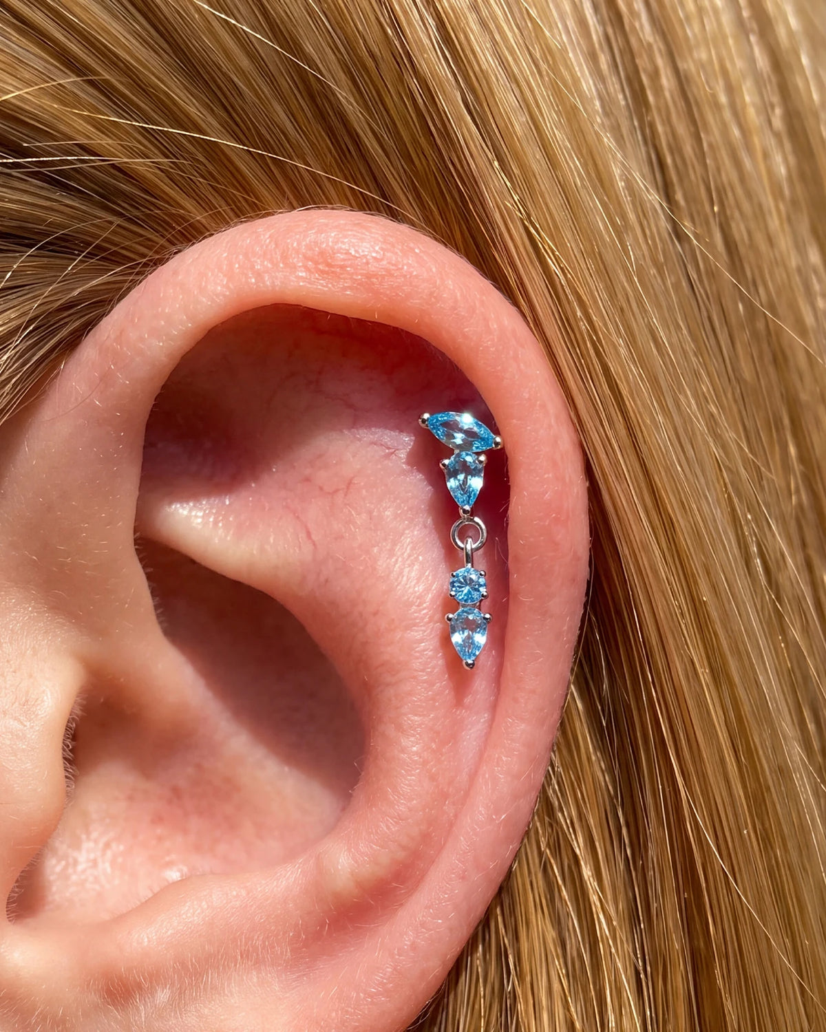 Dewfall Flatback Stud, silver with blue cubic zirconia, on-ear styling
