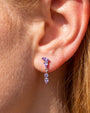 Dewfall Flatback Stud, silver with violet cubic zirconia, on-ear styling