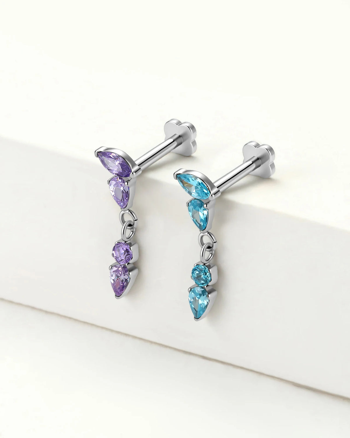 Dewfall Flatback Stud, silver with violet cubic zirconia, violet and blue designs together