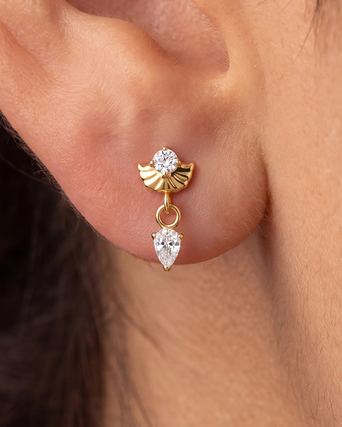 Deco Dew Flatback Stud, gold with clear cubic zirconia, on-ear styling