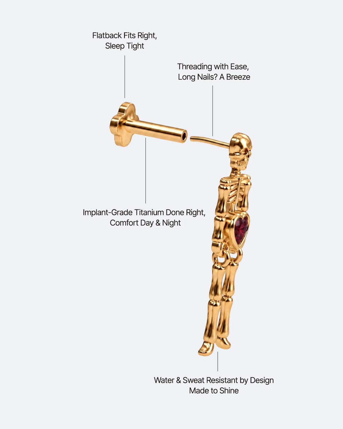 Undead Love skeleton flatback stud, gold with red heart zirconia, threadless fitting detail