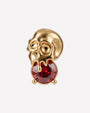 Skull Melt Flatback Stud in gold tone with garnet red cubic zirconia - front view