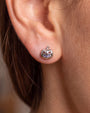 Wicked Grin pumpkin flatback stud, silver with purple blue cubic zirconia, lobe styling