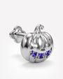 Wicked Grin pumpkin flatback stud, silver with purple blue cubic zirconia, side view
