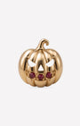 Wicked Grin pumpkin flatback stud, gold with red cubic zirconia, front view