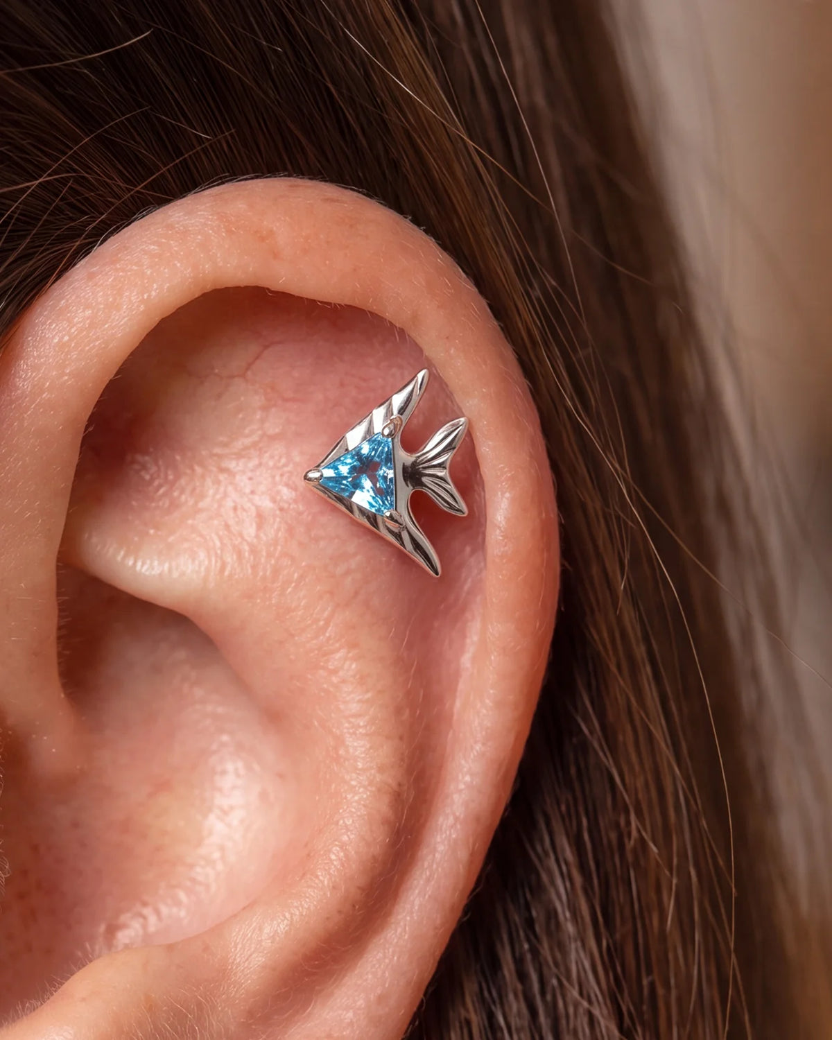Reef Angel Flatback Stud - Silver with blue cubic zirconia - product and styling view 2