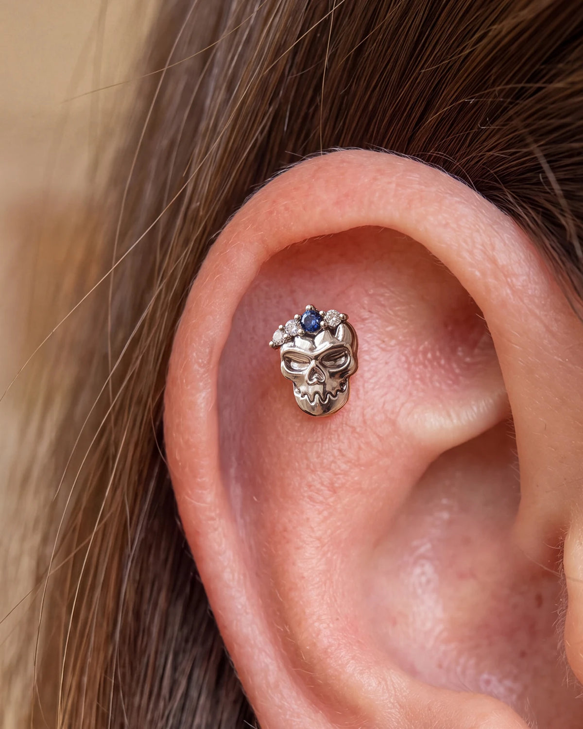 Crowned Mischief skull flatback stud, silver tone with purple cubic zirconia, image 4