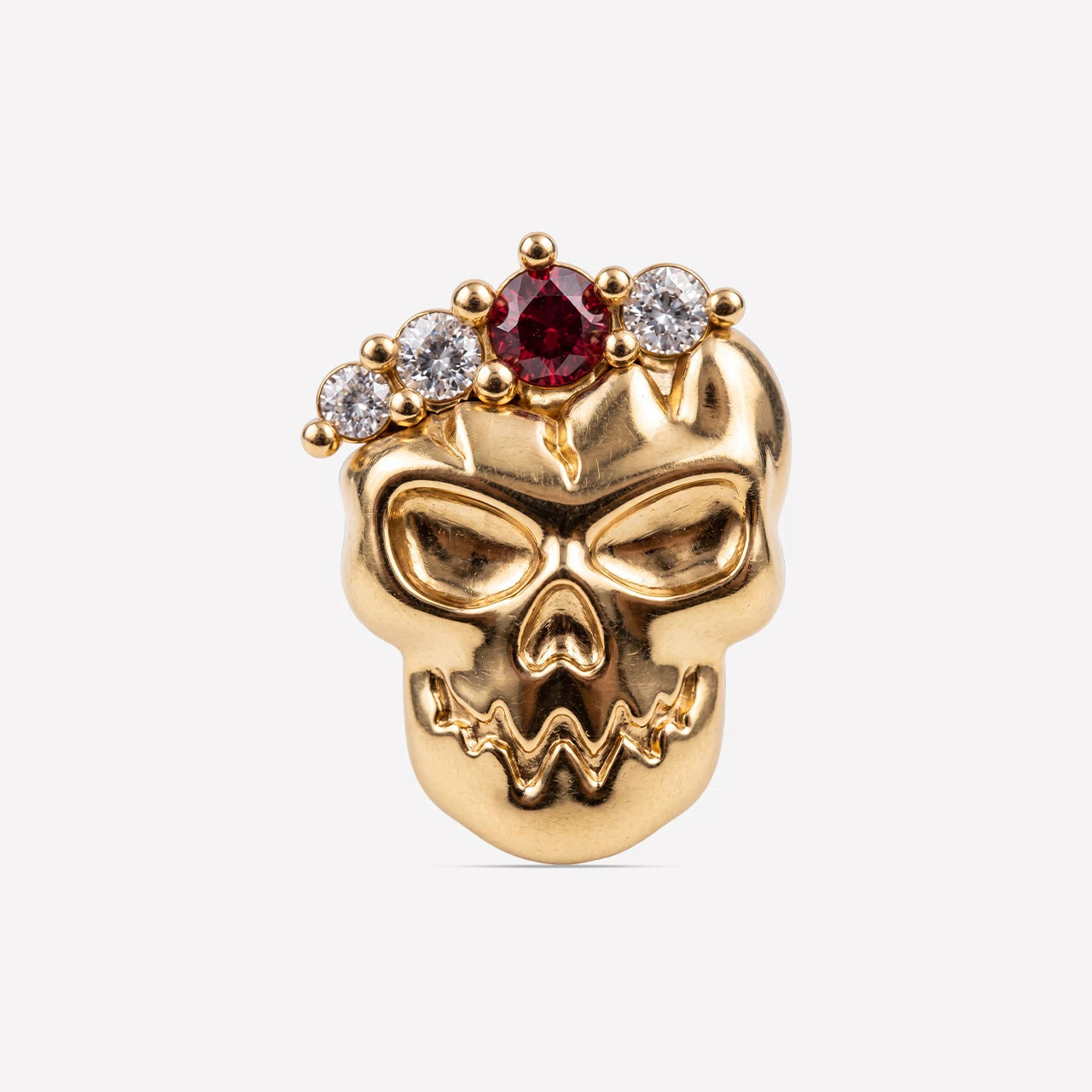 Crowned Mischief skull flatback stud, gold tone with red cubic zirconia, image 1