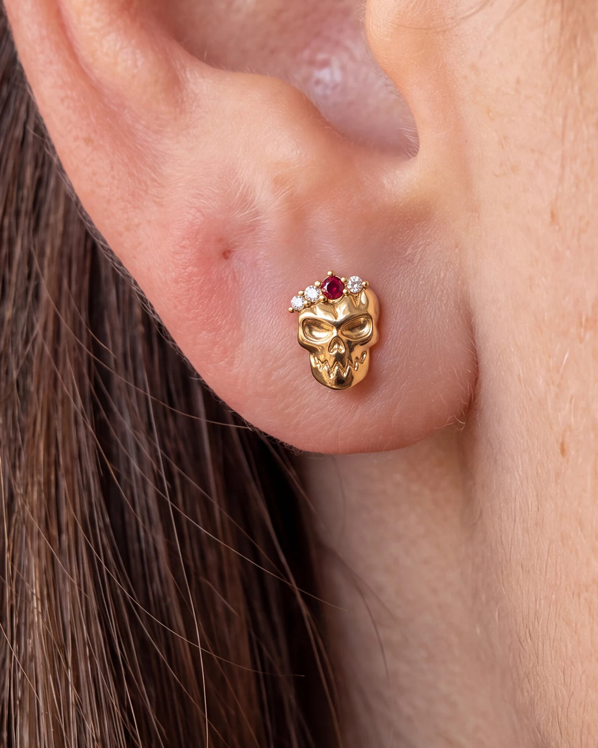 Crowned Mischief skull flatback stud, gold tone with red cubic zirconia, image 2