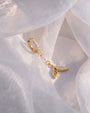 Mermaid Glow Drop Earrings Gold Crystal Clear styled scene