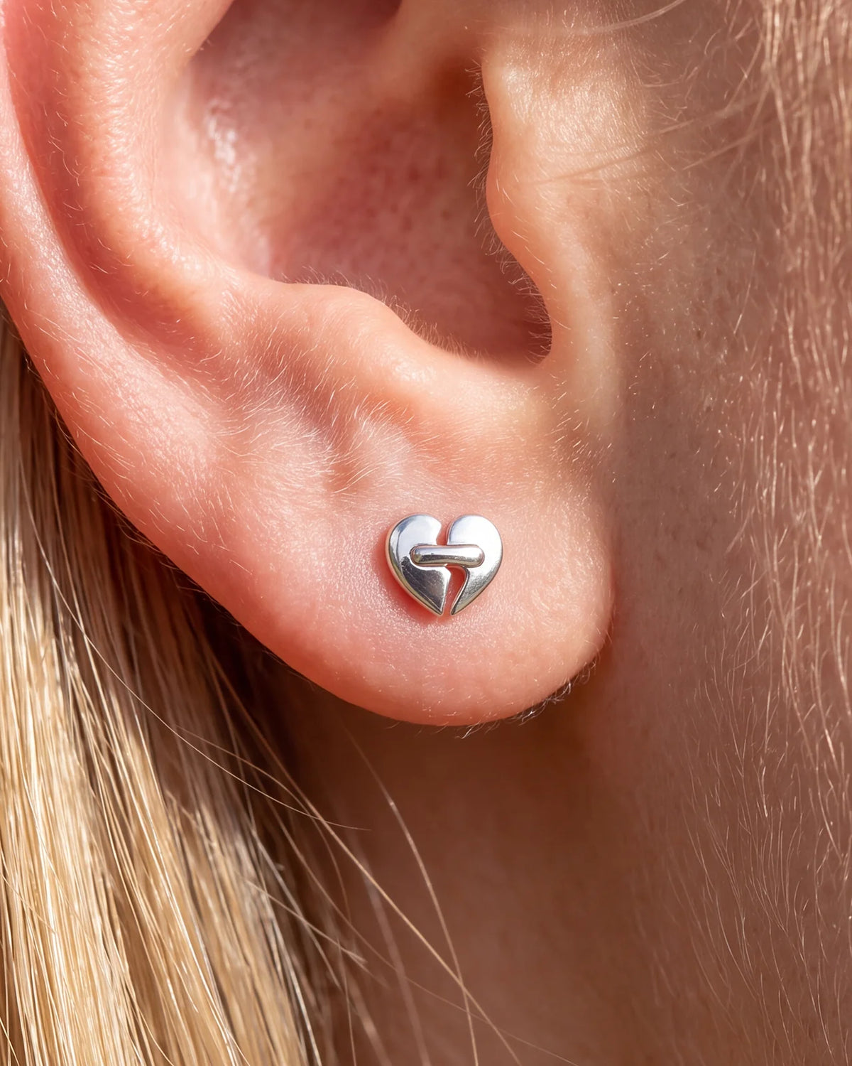 Heart Restart Flatback Stud in silver tone, lobe styling