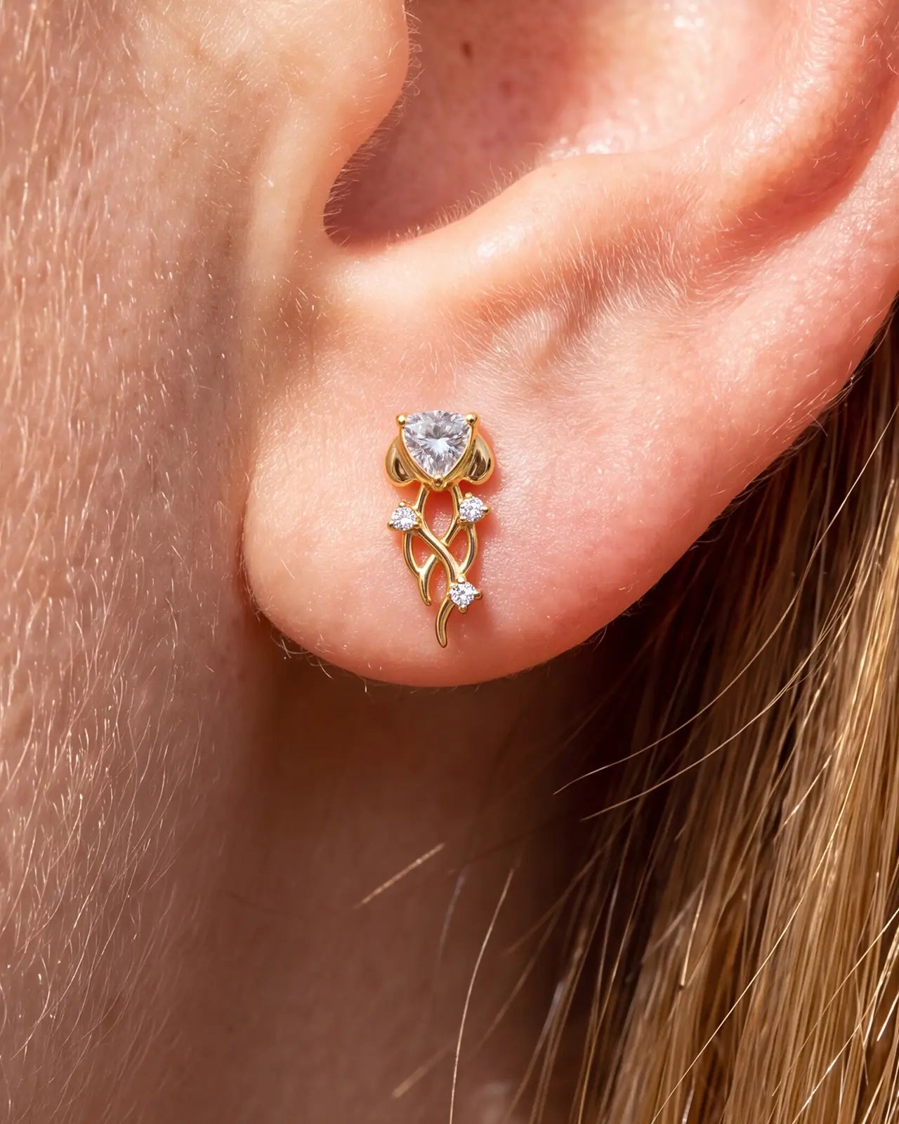Moonlit Jellyfish gold clear flatback stud worn on lobe
