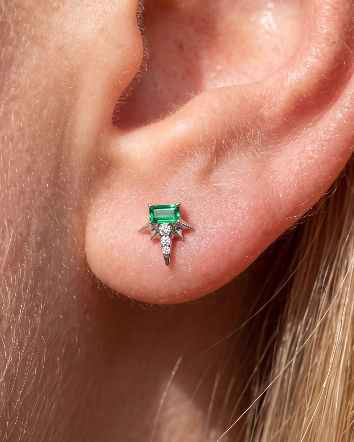 Radiant Wingcrest Flatback Stud, silver tone with green center stone, ear styling detail