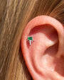 Radiant Wingcrest Flatback Stud, silver tone with green center stone, ear styling detail