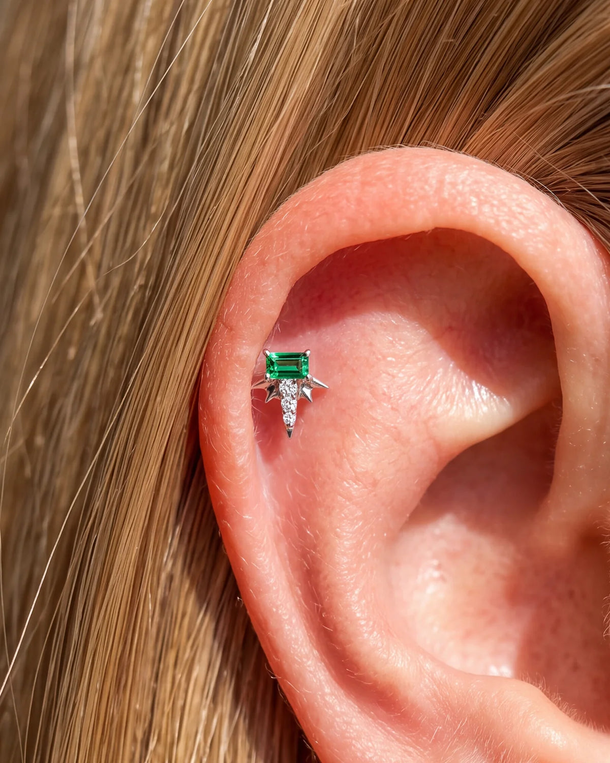 Radiant Wingcrest Flatback Stud, silver tone with green center stone, ear styling detail