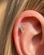 Radiant Wingcrest Flatback Stud, gold tone with light blue center stone, ear styling detail