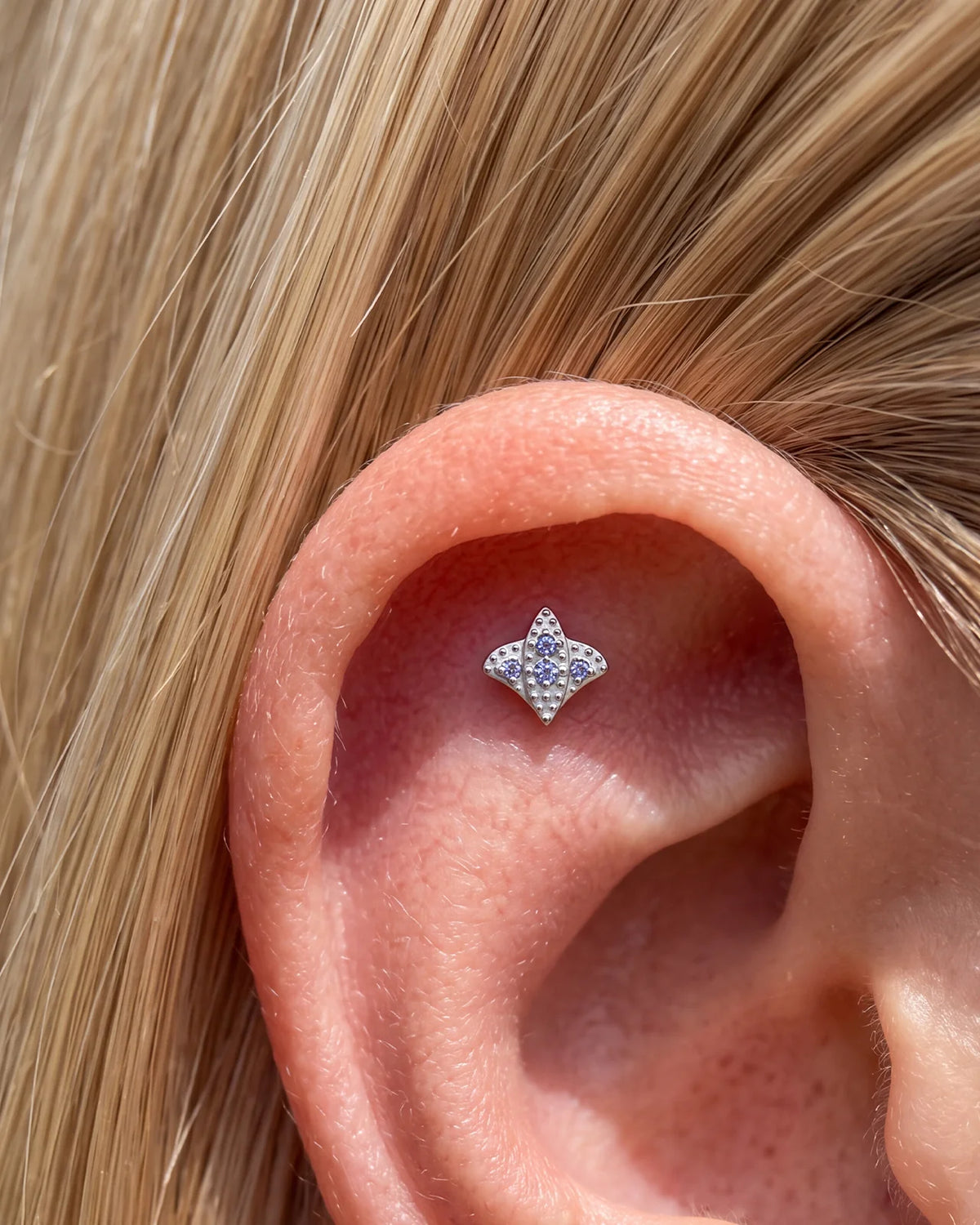 Royal Fleur Flatback Stud, silver tone with blue violet stones, ear styling detail