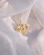 Royal Fleur Flatback Stud, gold tone with champagne stones, styled product view