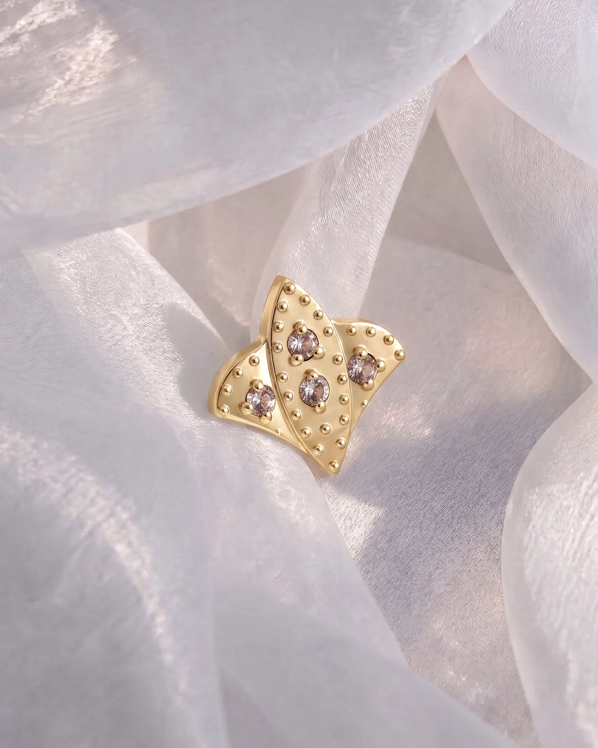 Royal Fleur Flatback Stud, gold tone with champagne stones, styled product view